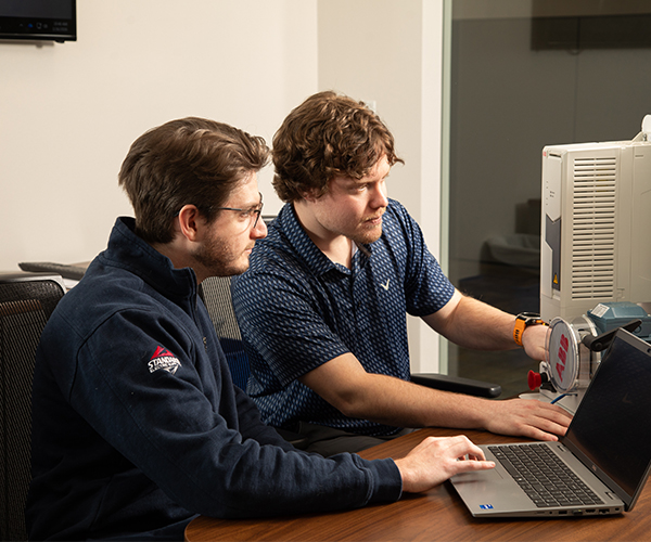 Industrial automation equipment being evaluated and tested for repair